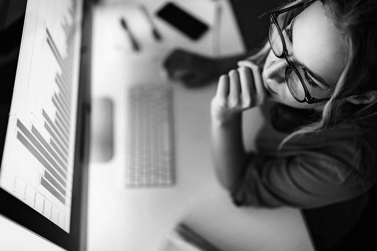 Woman looking at computer screen