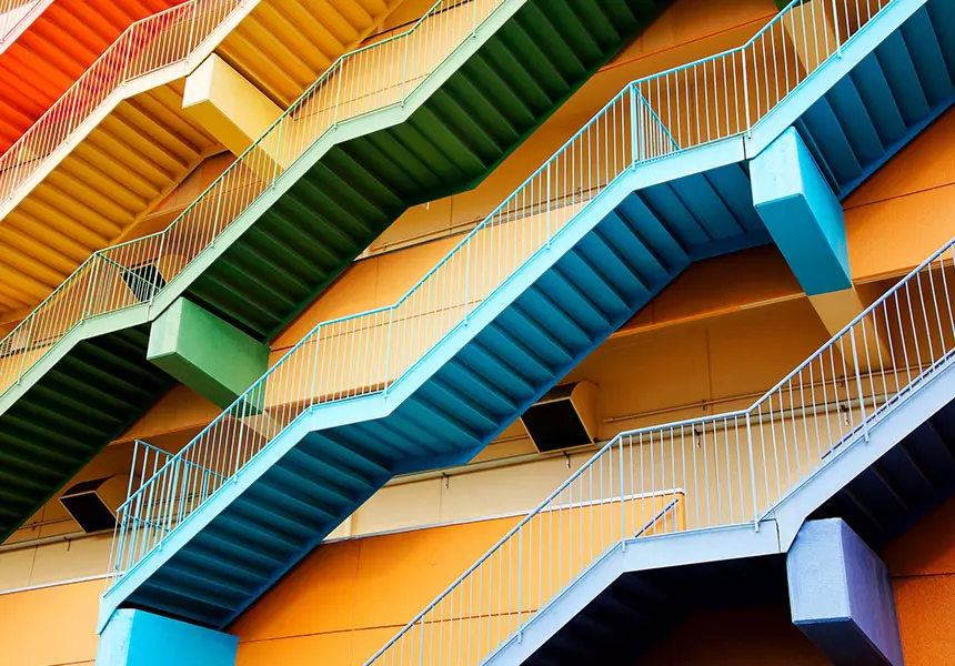 Colorful ladders attached to the wall