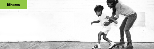 Lava shooting out of a small volcano in the dark.