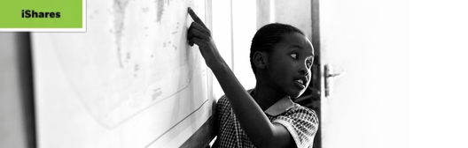 child pointing at a map