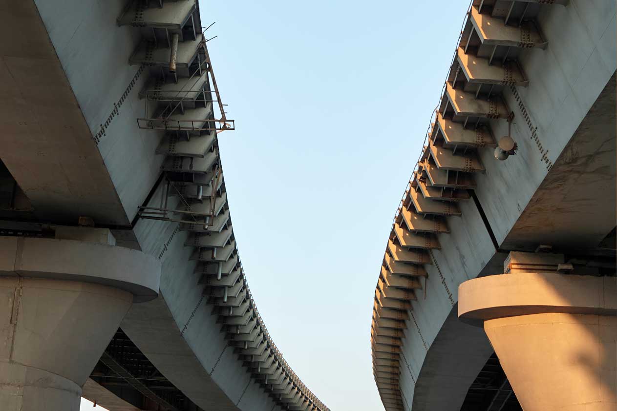 Image of two overhead expressways, viewed from the ground
