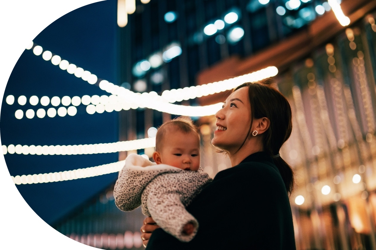 woman and child staring at lights