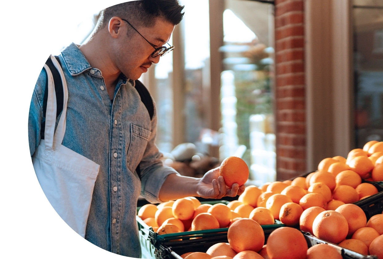 man buying fruit