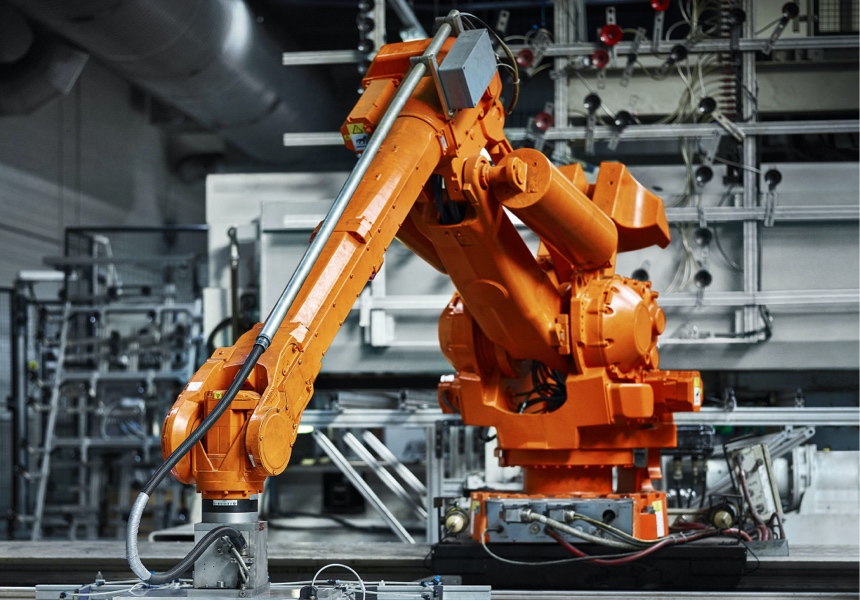 A robot on an assembly line.
