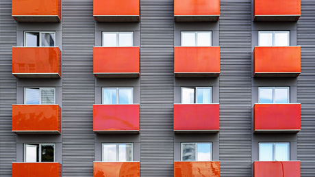 Windows with red balconies