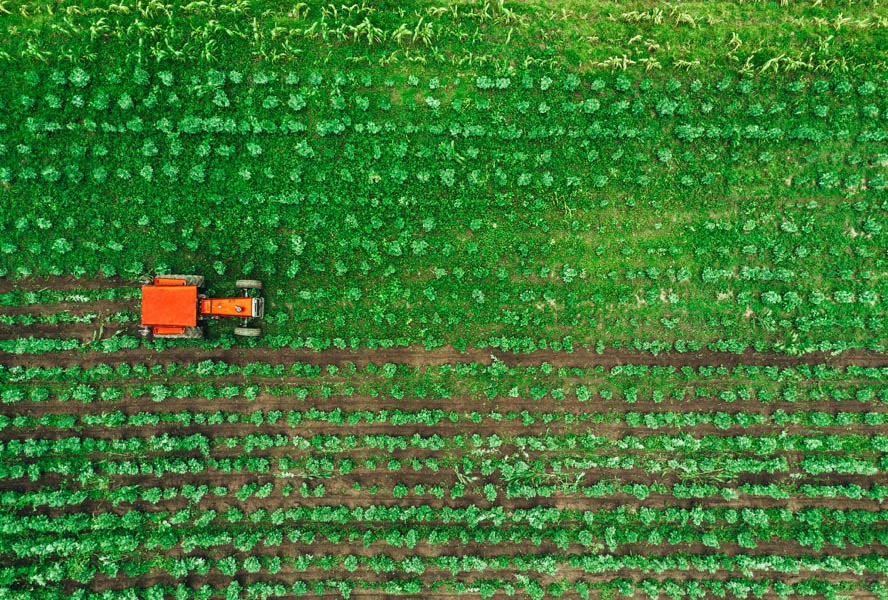 Farm with tractor operating