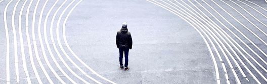 Man standing on flexible street lines