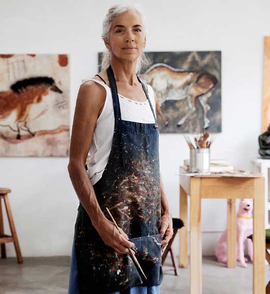 Aged women with paintings 