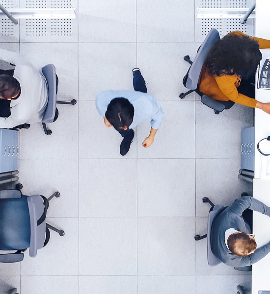 Overhead view of an office with a preson standing