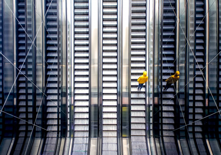 Man on escalator 