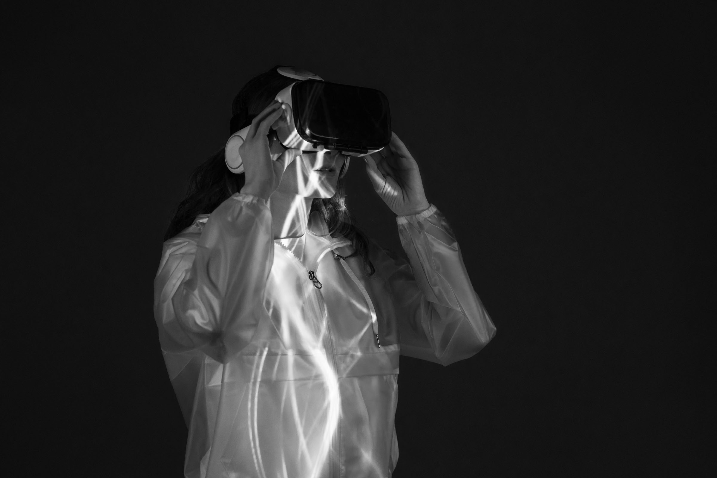 image of person peering into virtual reality headset