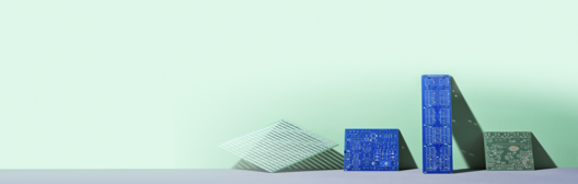 Blue and green geometrical shapes lined up against a light green background.