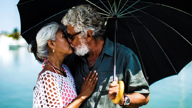 retired couple kissing