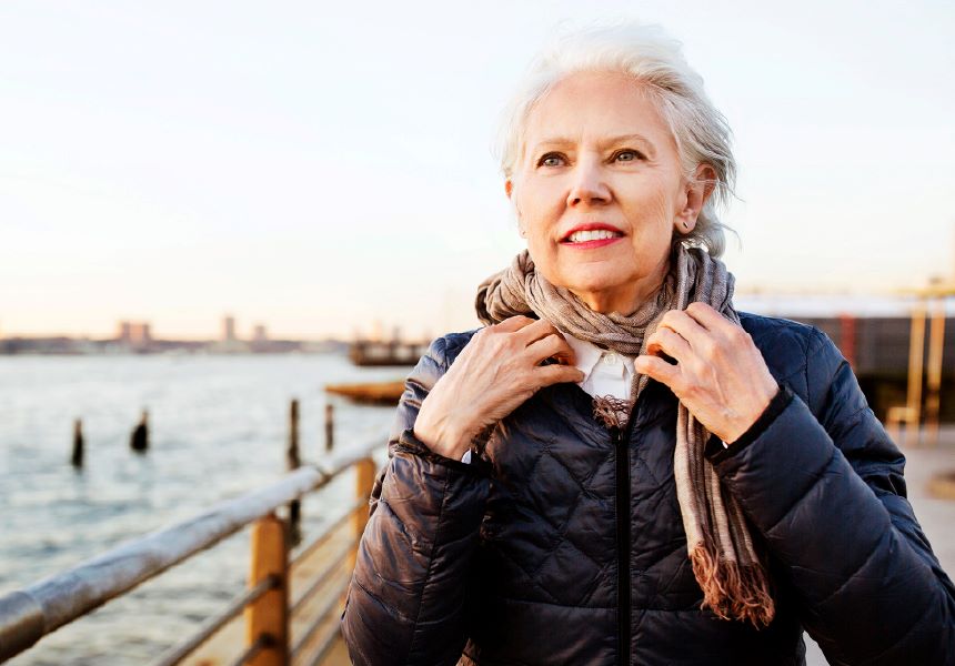 retired woman walking happily