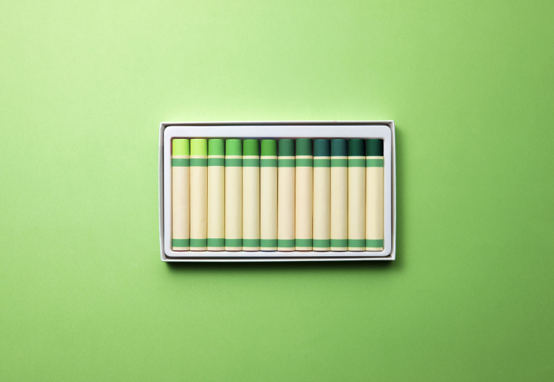 box of green crayons