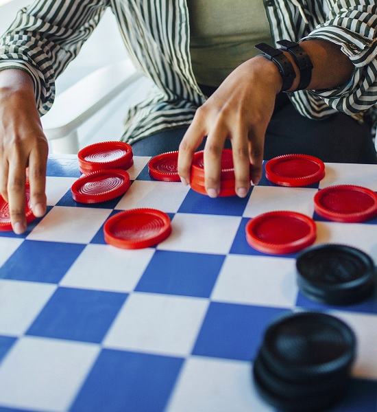Checkers on a game board