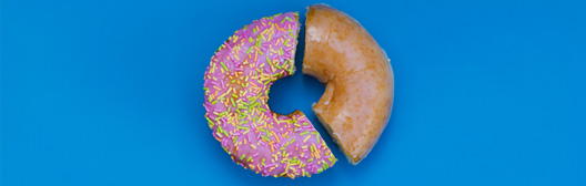 donut cut into sections with different icings