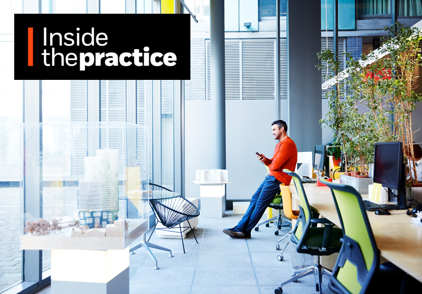 Business man sitting on table