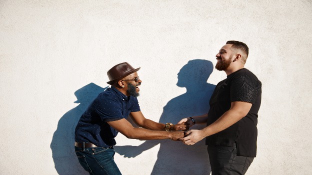 Two men shaking hands, symbolizing partnership and collaboration in retirement planning discussions