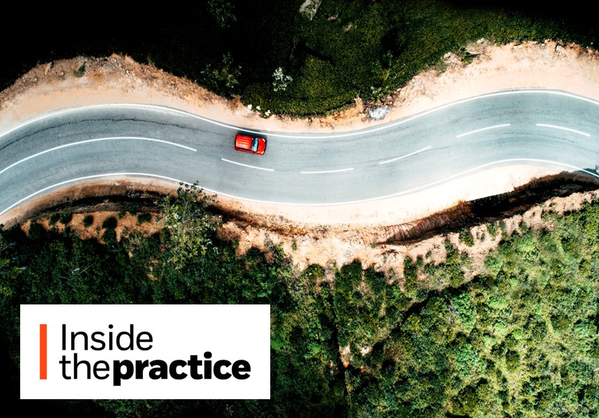 Car driving along a wavy path