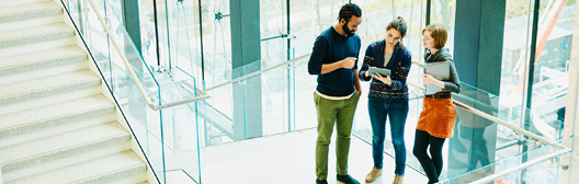 three people discussing
