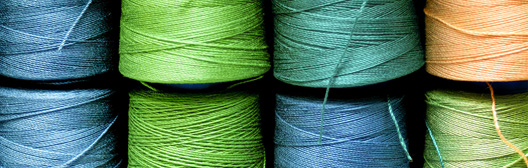 Yarn representing how different tax rates combine to create total tax bill