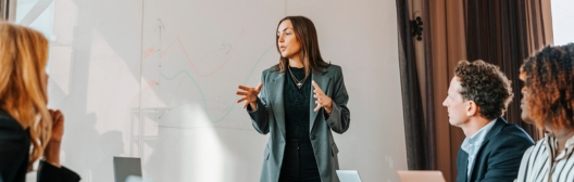 Professional woman speaking with clients