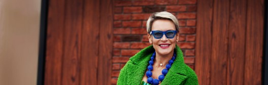 Well-dressed woman smiling