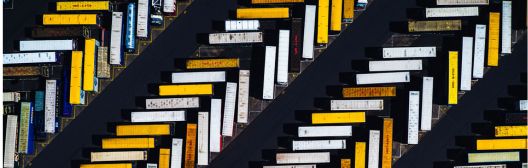 Image of aerial view of trucks parked in diagonal fashion.