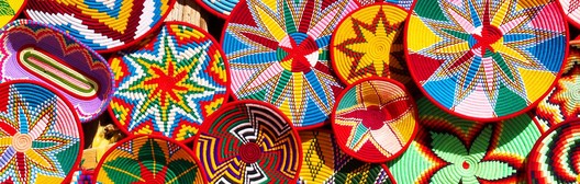 Colorful woven baskets illustrating diversification within a long/short investment strategy.