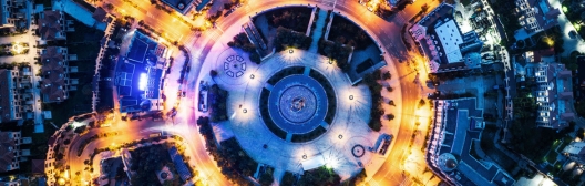 Overhead view of a brightly lit roundabout