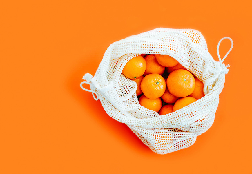Orangen in einem Netzsack