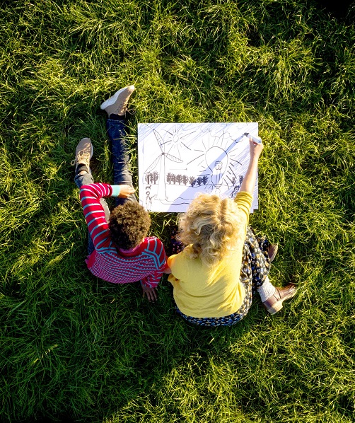 children drawing wind turbines