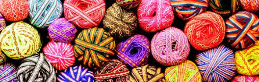A group of colourful yarn balls