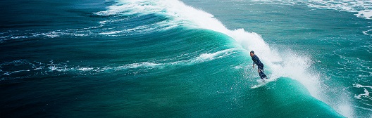 Surfer surfing on waves