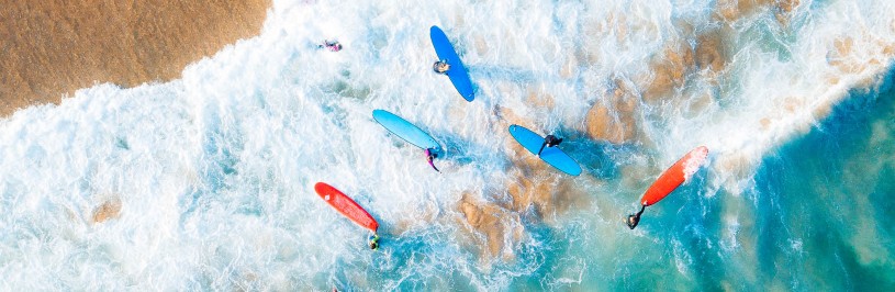 surfers on the beach