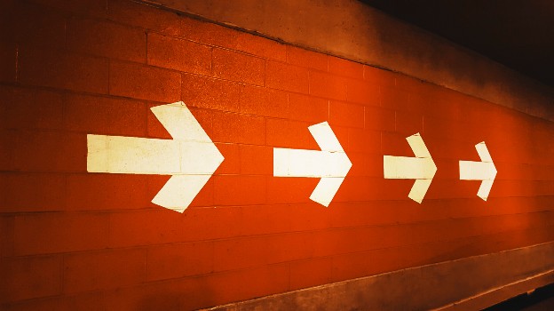 Arrows on a red wall