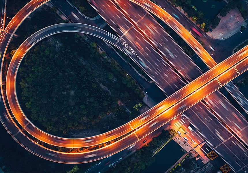 Bird's eye view of freeway overpass at night