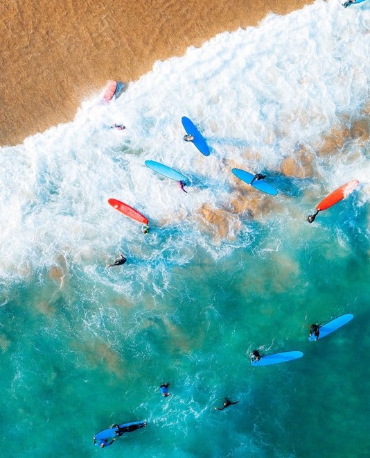 Surfers in the waves