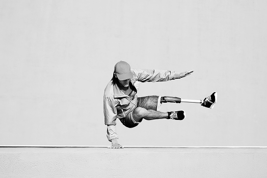 Man balancing on one hand