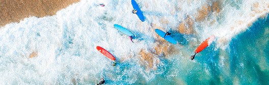 Picture of a beach and surfers