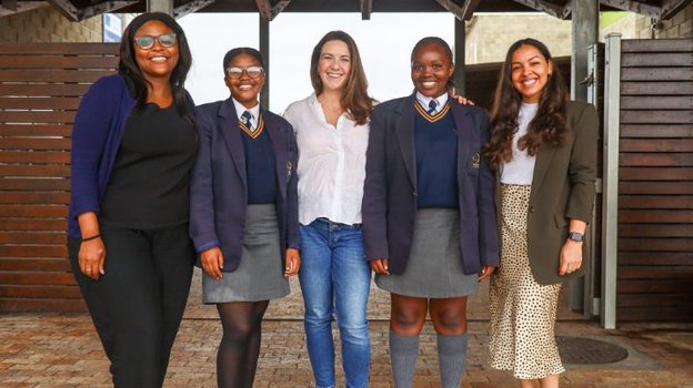 BlackRock staff members with christel house students