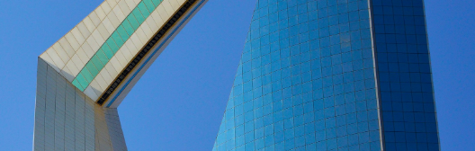 Tall glass building with hollow centre