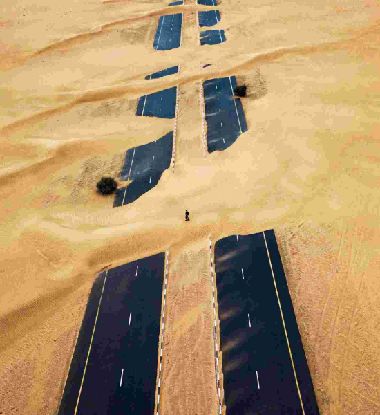 Part of a road covered with sand