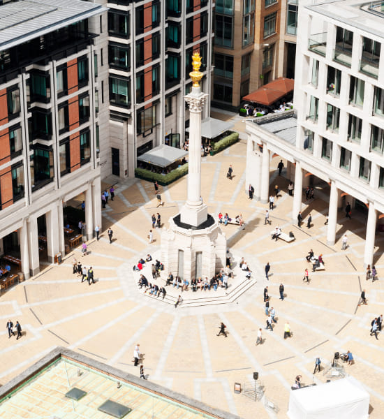 View of a central city office and a gold monument