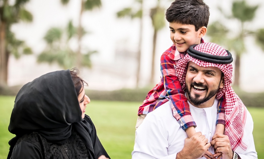 A Saudi couple with their son