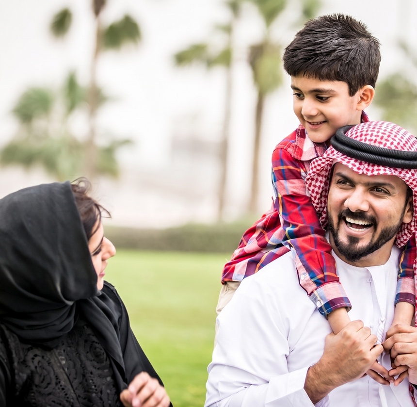 A Saudi couple with their son