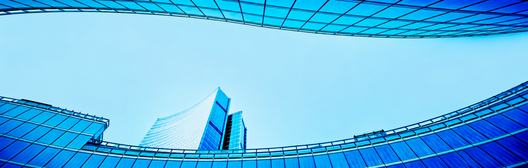 A low-angle view of modern glass skyscrapers