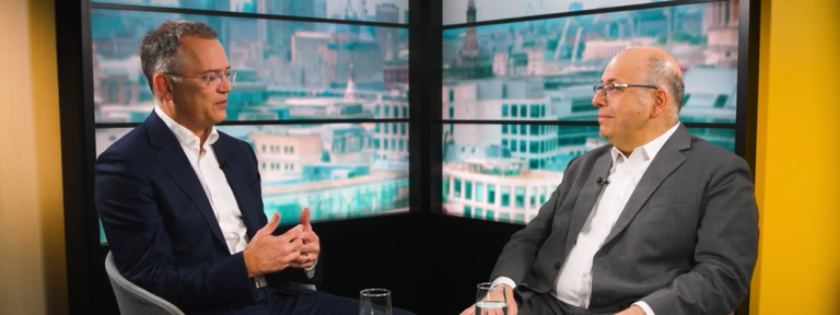 Image of arek Chouman, Global Head of the Aladdin Client Business and Hans Georgeson, CEO, Royal London Asset Management, sitting together talking 