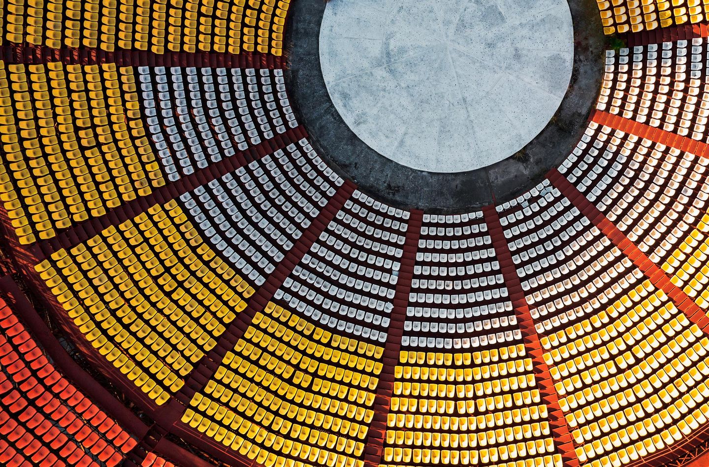 Colorful geometric dome ceiling with central skylight.
